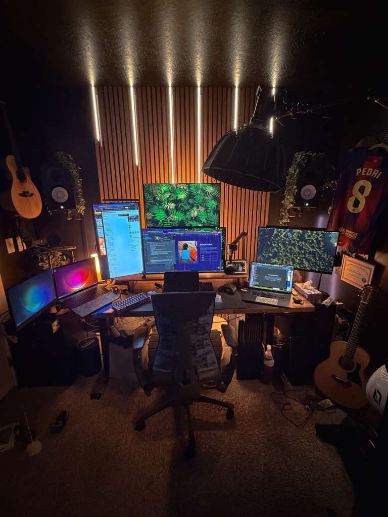 Richie's command center โ multi-monitor AI development setup